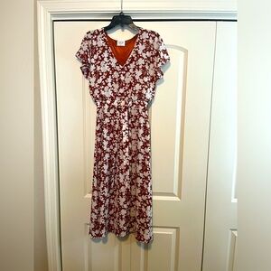 Sienna Sky fully lined extra small V-neck flutter sleeve tie waist maxi dress.